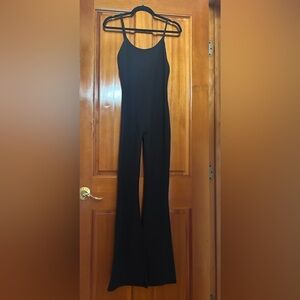 Aura Flare Jumpsuit in Ribbed Black